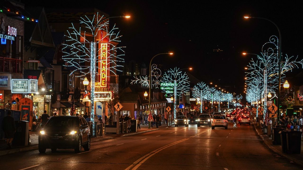 Downtown Gatlinburg Parkway adorned with festive Christmas lights during the holiday season.